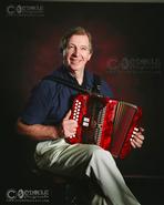 Irish photography. Dancing Fingers. Irish Traditional Music. Master Box Player Martin Mulhaire from Queens, NY