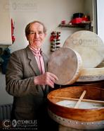 Irish photography. Dancing Fingers. Irish Traditional Music. Renouned Bodhran maker Charlie Byrne from Thurles - Co. Offaly                                              