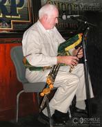 Dancing Fingers - Irish Traditional Music. Mattie Connolly (NYC) Photographed playing a set of pipes made for Actor James Cagney by Leo Rowsome