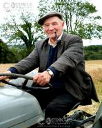 Irish photography. Spirit of the Celts. The Irish Character. Peter Murtagh on his Massey Ferguson  - Carnew Heritage Day 2005