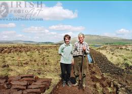 Ancient World - An Irish Heritage. Father & Daughter Cutting Turf  - Oughterard, Co. Galway 1996