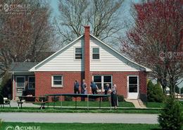 Fields Of Gold - The Amish Way. Amish Family Playing Outside their Non Farming Amish Home