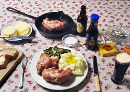 Traditional Irish Cottage Food. Pan Roasted Irish Crubeens (trotters - pigs feet) with Garden Cabbage & Champ