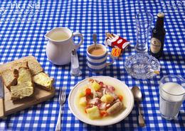 Traditional Irish Cottage Food. Irish Coddle (sometimes known as Dublin Coddle) with a Selection of Homemade Breads & a Mug of Tea